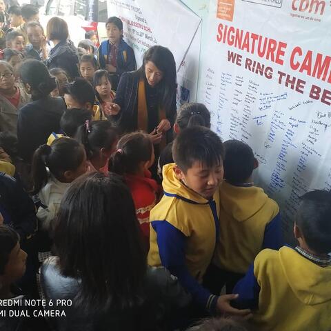 Various school students signing on the Signature Campaign for 'Ring the Bell' activity for RAISE-NE. Various school students signing on the Signature Campaign for 'Ring the Bell' activity for RAISE-NE.