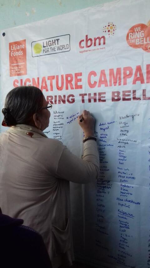 Chief Guest for the 2nd Day of Umang Festival, Smti. Kavita Acharya, signing on the Signature Campaign for 'Ring the Bell' activity for RAISE-NE. Chief Guest for the 2nd Day of Umang Festival, Smti. Kavita Acharya, signing on the Signature Campaign for 'Ring the Bell' activity for RAISE-NE.