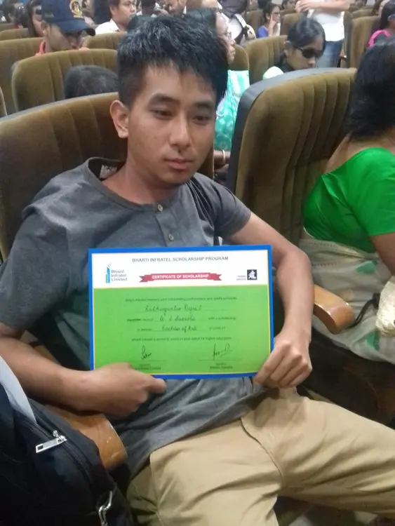 Ruokuowetuo Riipreo (low vision) received scholarship from Bharti Infratel at Guwahati.